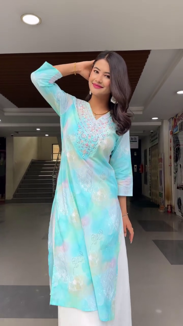 Women's Ethnic Kurti Set Featuring Soft Pastel Tie-Dye Prints in Blue and Pink, Intricate Embroidery on the Neckline, 3/4 Sleeves, Paired with Flowing White Palazzo Pants – Perfect for Festive, Casual, and Daily Wear