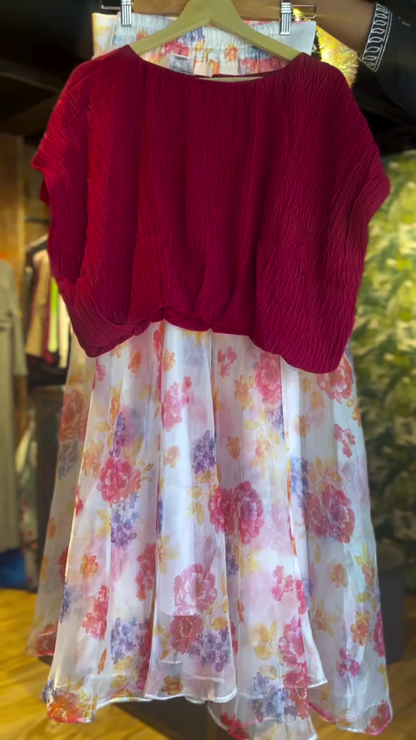 Red Crinkled Top with Flowing White Floral A-Line Skirt – Two-Piece Outfit Featuring Vibrant Multicolor Blossom Print and Lightweight Sheer Overlay for a Graceful, Feminine Look