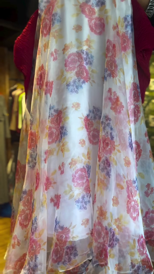 Red Crinkled Top with Flowing White Floral A-Line Skirt – Two-Piece Outfit Featuring Vibrant Multicolor Blossom Print and Lightweight Sheer Overlay for a Graceful, Feminine Look - Image 2