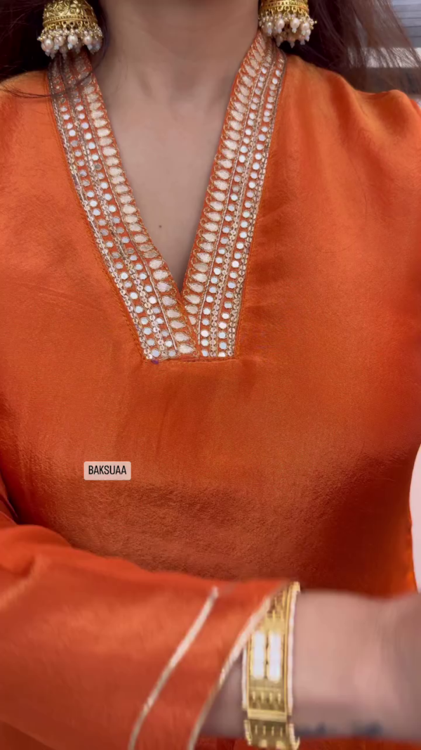 Orange Silk Straight Kurta Set with Intricate Mirror Work Neckline, Embroidered Border Dupatta, and Coordinated Pants Festive and Ethnic Wear - Image 2