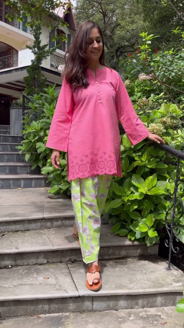 Summer Cotton Suit Set for Women Featuring a Bright Pink Embroidered Kurti with Scalloped Hem and Button Detailing, Paired with Vibrant Lime Green Floral Printed Pants – Perfect for Casual and Festive Wear
