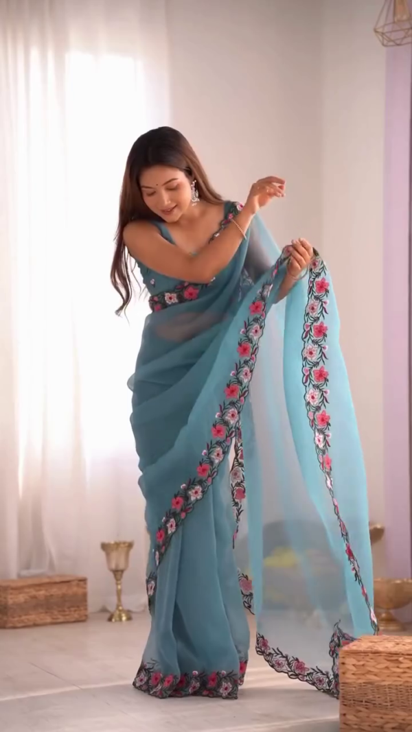 Sky Blue Georgette Saree with Intricate Multicolor Floral Embroidery Border and Matching Designer Blouse  Perfect for Festive Occasions, Weddings, and Traditional Celebrations