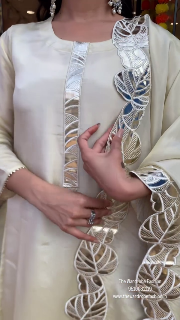 Cream Designer Cape Style Palazzo Set with Mirror Work Detailing and Floral Embroidery, Paired with a Coordinated Inner and Clutch – Perfect for Festive and Party Wear - Image 3