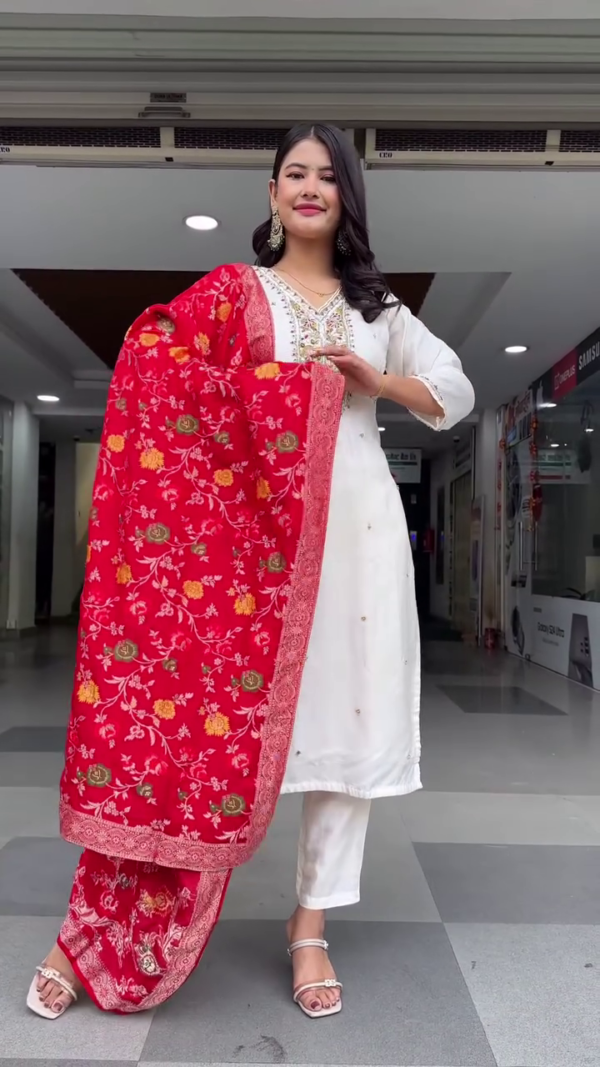 Graceful Off-White Straight-Cut Kurta Set with Delicate Floral Embroidery on the Neckline, Light Mirror Accents, and Paired with a Bold Red Floral Woven Dupatta – A Timeless Classic for Traditional Gatherings and Festive Wear - Image 2