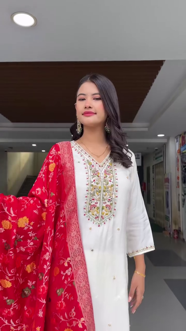 Graceful Off-White Straight-Cut Kurta Set with Delicate Floral Embroidery on the Neckline, Light Mirror Accents, and Paired with a Bold Red Floral Woven Dupatta – A Timeless Classic for Traditional Gatherings and Festive Wear - Image 3