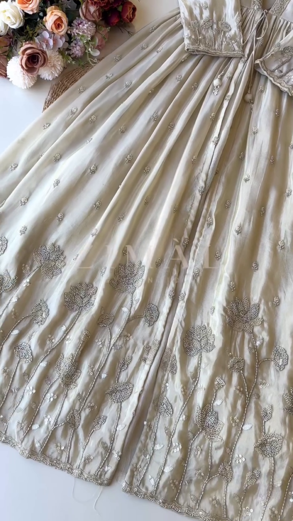 Luxury Ivory Hand-Embroidered Formal Maxi Dress – Full-Length Flared Silhouette with Intricate Silver Zari, Sequin and Beadwork on Soft Silk Fabric, Front-Tie Bodice, and Floral Detailing – Perfect for Weddings, Special Occasions, or Festive Celebrations - Image 2