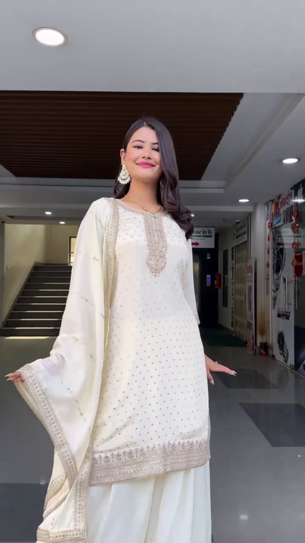 Off-White Traditional Ethnic Set Featuring Embroidered Straight Kurta with Intricate Golden Sequin and Thread Work, Paired with Flowy Sharara Pants and a Matching Soft Net Dupatta Adorned with Subtle Embellishments – Perfect for Festive Celebrations and Special Occasions - Image 2
