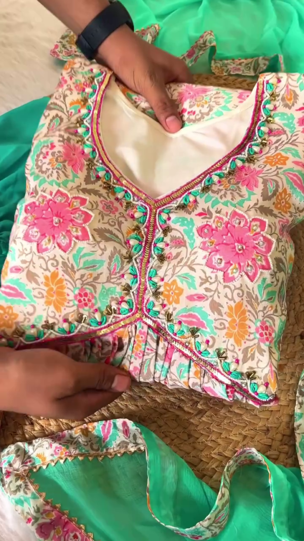Elegant Multicolor Floral Printed Anarkali Kurta Set with Contrasting Green Straight Pants and Matching Dupatta – Beautifully Detailed Neckline and Comfortable Fit, Perfect for Festive Occasions and Ethnic Celebrations with Complementary Traditional Footwear