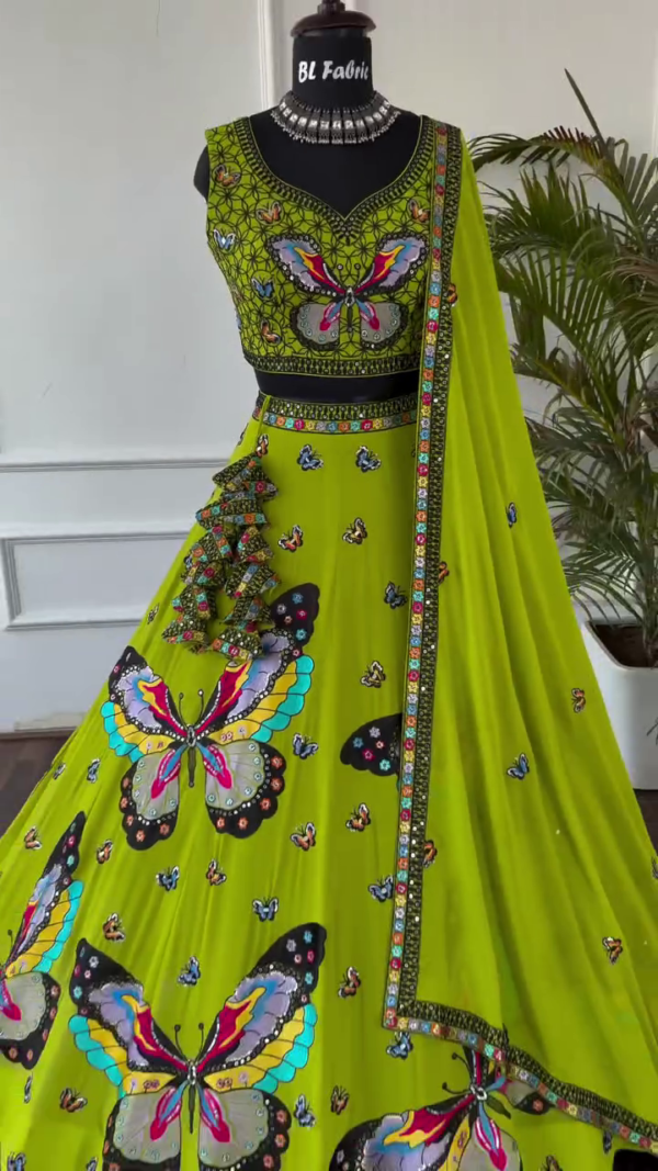Vibrant Lime Green Lehenga Choli Set Featuring Colorful Butterfly Embroidery on Blouse and Flared Skirt, Accentuated with Intricately Embellished Borders, Coordinated Tassels, and Matching Dupatta – A Playful yet Elegant Festive Ensemble