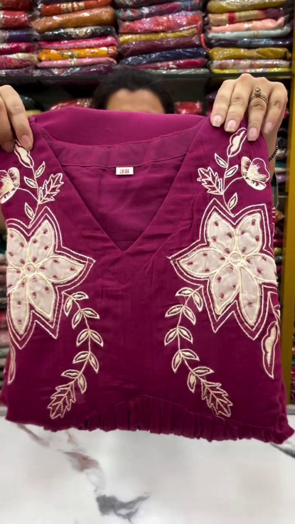Magenta Anarkali Kurta Set with Intricate White Floral Thread Embroidery, Matching Dupatta, and Coordinated Bottom – Perfect for Festive and Traditional Occasions