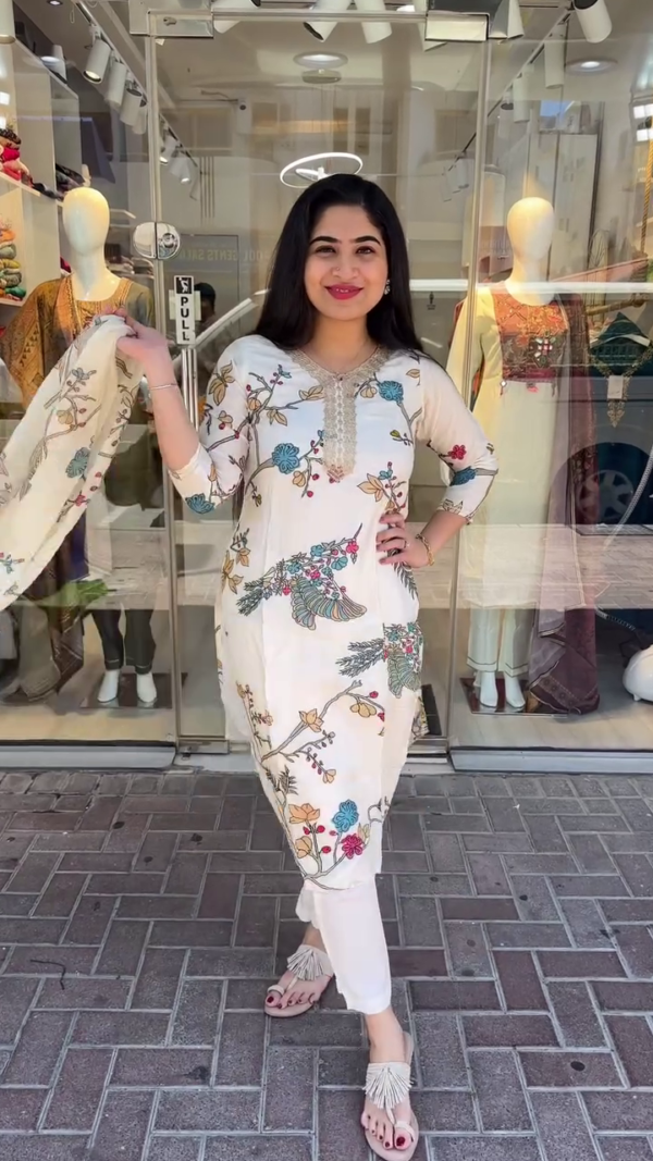 Off-White Cotton Kurta Set with Colorful Floral Embroidery, Paired with Matching Printed Dupatta and Straight Pants – Perfect for Casual Outings, Day Events, and Summer Festive Wear - Image 2