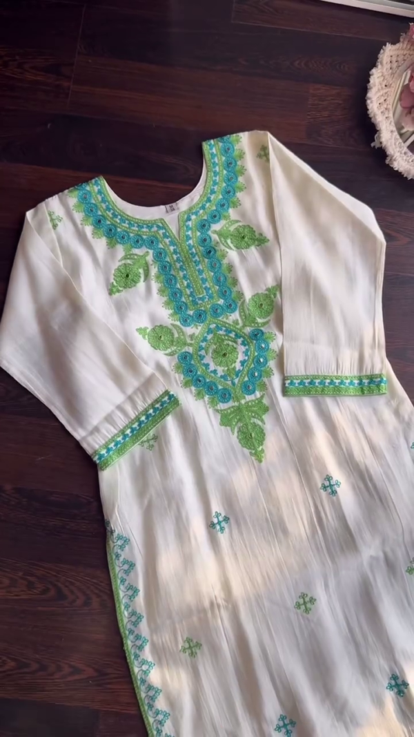 White Cotton Kurta Set with Green and Blue Thread Embroidery and Matching Sheer Dupatta Featuring Delicate Floral Motifs and Intricate Neck Detailing for a Graceful Ethnic Look - Image 2