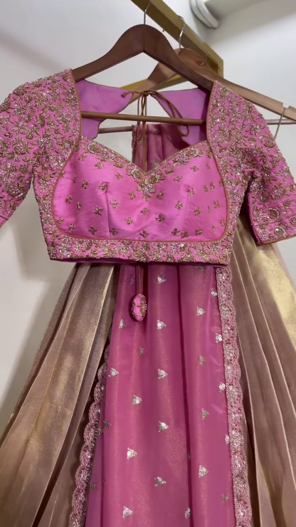 Pink Silk Lehenga Set Featuring Heavily Embellished Sweetheart Neck Blouse with Intricate Sequin Work, Paired with Matching Embroidered Skirt and Contrasting Gold Tissue Dupatta – A Perfect Blend of Traditional Craftsmanship and Festive Glamour - Image 2