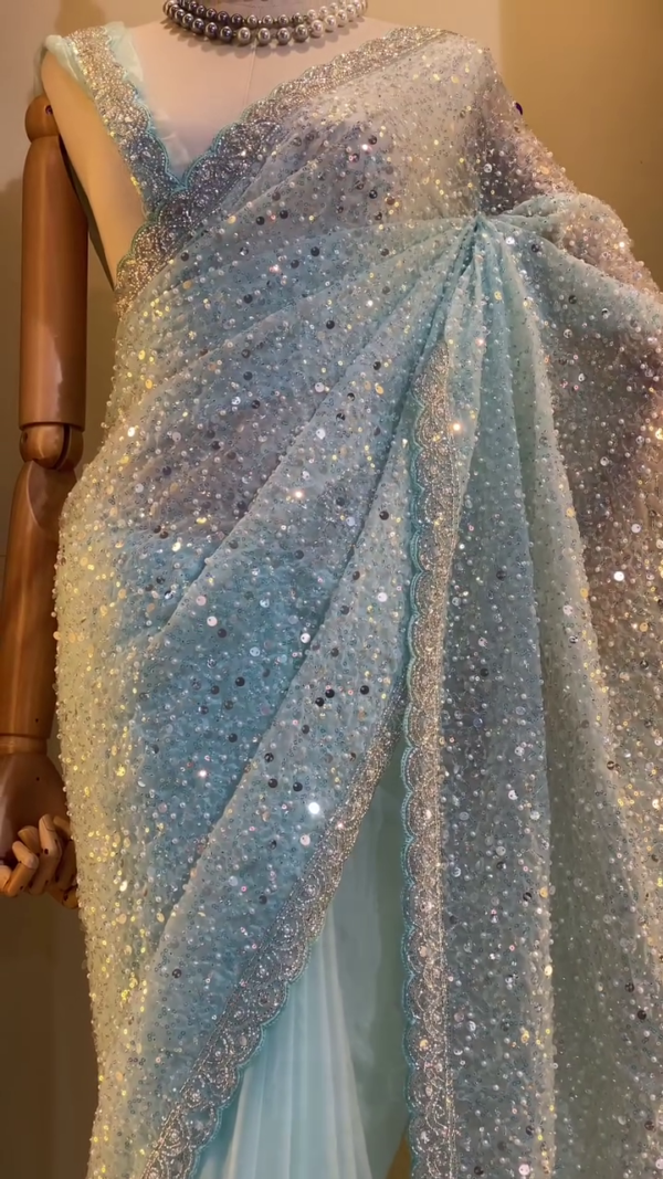 Ice Blue Designer Net Saree with Heavy Sequin and Stone Embellishments, Intricate Lace Border, and Matching Blouse – Perfect for Weddings, Receptions, and Grand Celebrations - Image 2