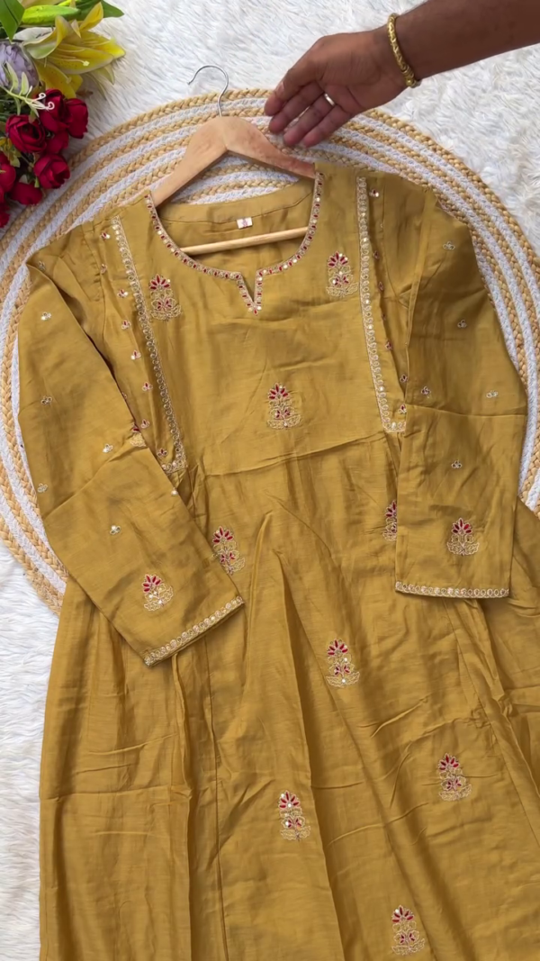 Mustard Yellow Cotton Kurta Set with Dupatta Featuring Mirror Work, Red Thread Detailing, and Floral Motifs – Elegant Traditional Ethnic Wear for Women - Image 2