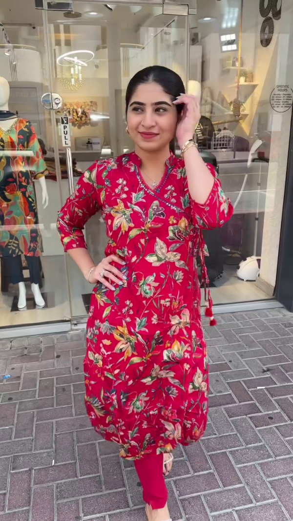 Chic Red Floral Printed Wrap-Style Kurta Set Featuring Overlapping V-Neckline with Tassel Tie Detailing, 3/4 Sleeves, and Coordinated Solid Pants – A Stylish and Comfortable Choice for Everyday Wear, Festive Gatherings, and Casual Outings with a Contemporary Ethnic Touch - Image 2