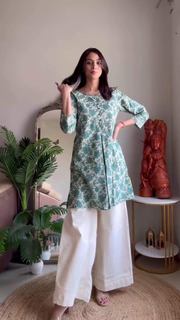 Lightweight Summer Multi-Shade Cotton Kurta Set Featuring Breezy Short Kurtis with Delicate Pintuck and Button Details, All-Over Floral Prints in Soft Yellow and Cool Teal Hues, Paired with Flowy White Palazzos – Perfect for Effortless Everyday Elegance and Warm-Weather Comfort - Image 2