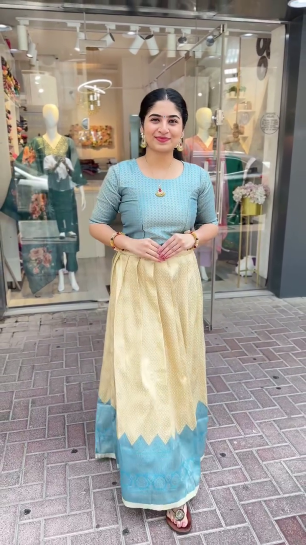 Elegant Blue Choli with Contrast Gold Zari-Woven Silk Skirt – A Timeless Traditional Ensemble with Rich Textures and Subtle Shine, Ideal for Festive and Cultural Celebrations