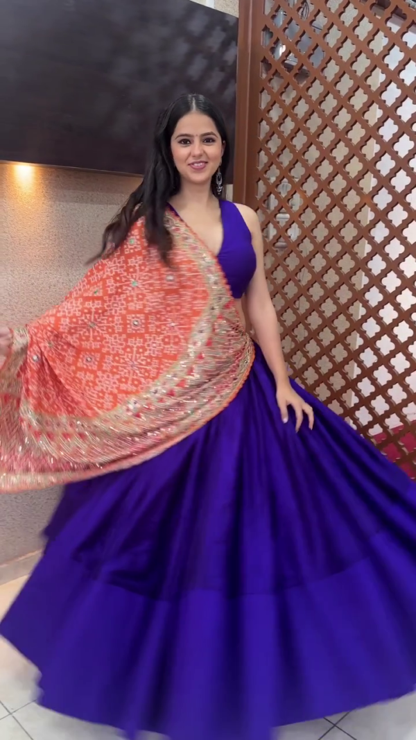 Royal Blue Lehenga Choli with Vibrant Orange Bandhani Dupatta & Mirror Work – Festive-Ready Look