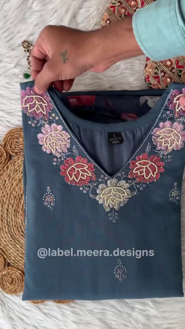 Elegant Navy Blue Embroidered Kurta Set with Intricate Floral Detailing at the Hem and Matching Floral Printed Dupatta for Festive or Semi-Formal Occasions.