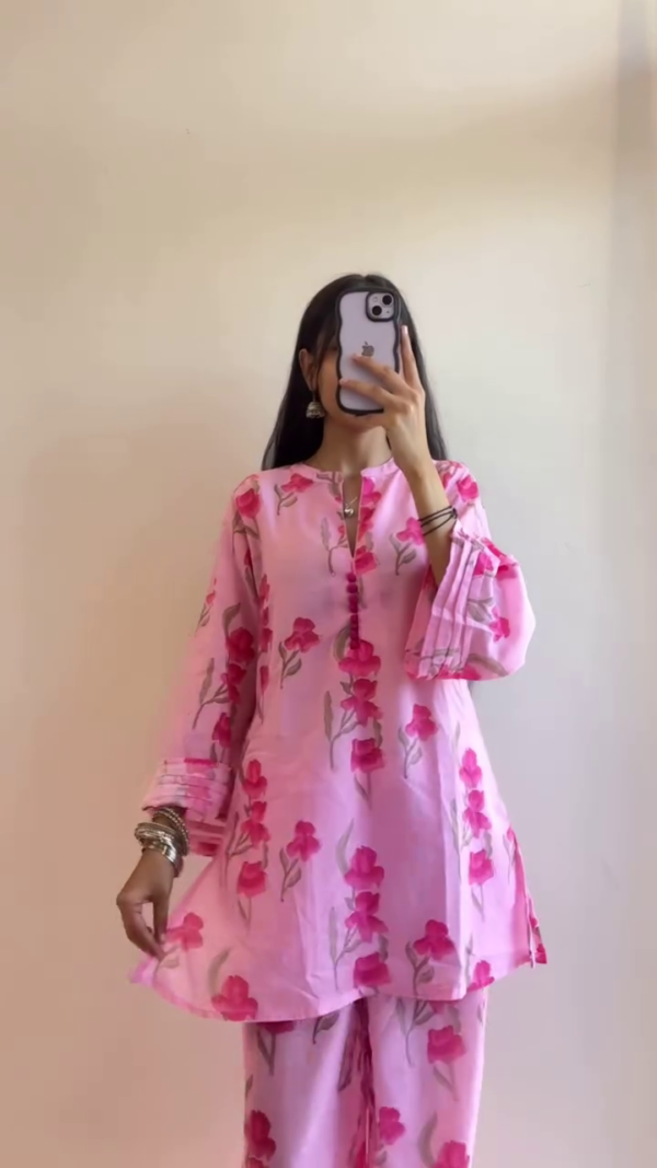 Stylish and Comfortable Kurta Sets – Black and White Striped Cotton Kurta with Trousers & Pink Floral Print Kurta Set for a Fresh, Casual Look