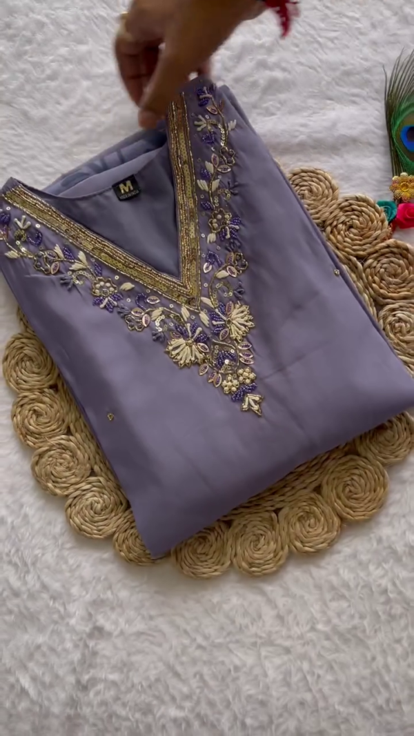 Dusty Lavender Straight Kurta Set with Golden Embroidered Neckline – Paired with Organza Dupatta Featuring Bold Monotone Leaf Motifs – Subtle, Elegant & Breezy for Any Occasion
