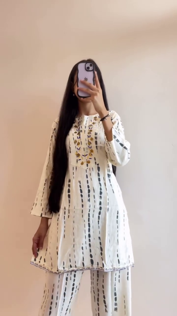 Stylish and Comfortable Kurta Sets – Black and White Striped Cotton Kurta with Trousers & Pink Floral Print Kurta Set for a Fresh, Casual Look - Image 2