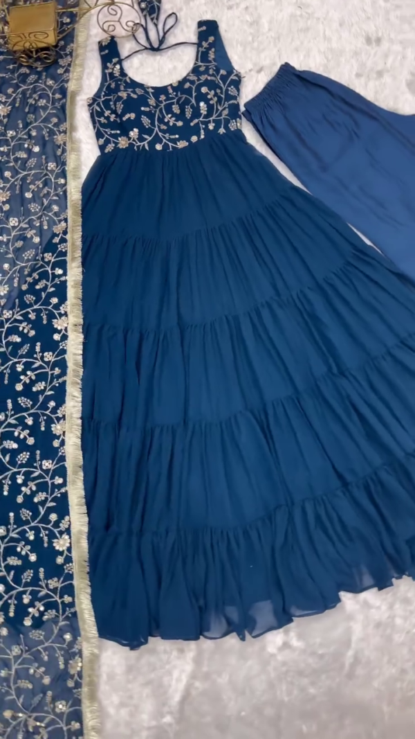 Elegant Blue Tiered Dress with Intricate Floral Embroidery on the Bodice, Paired with a Matching Dupatta and Bottom - Image 2