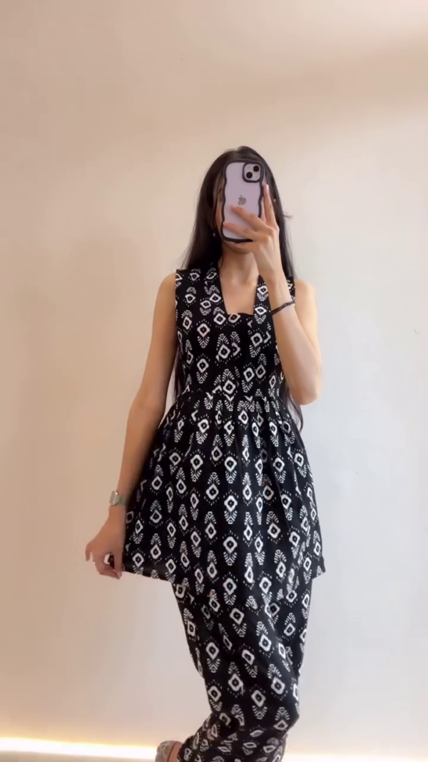 Stylish and Comfortable Kurta Sets – Black and White Striped Cotton Kurta with Trousers & Pink Floral Print Kurta Set for a Fresh, Casual Look - Image 3