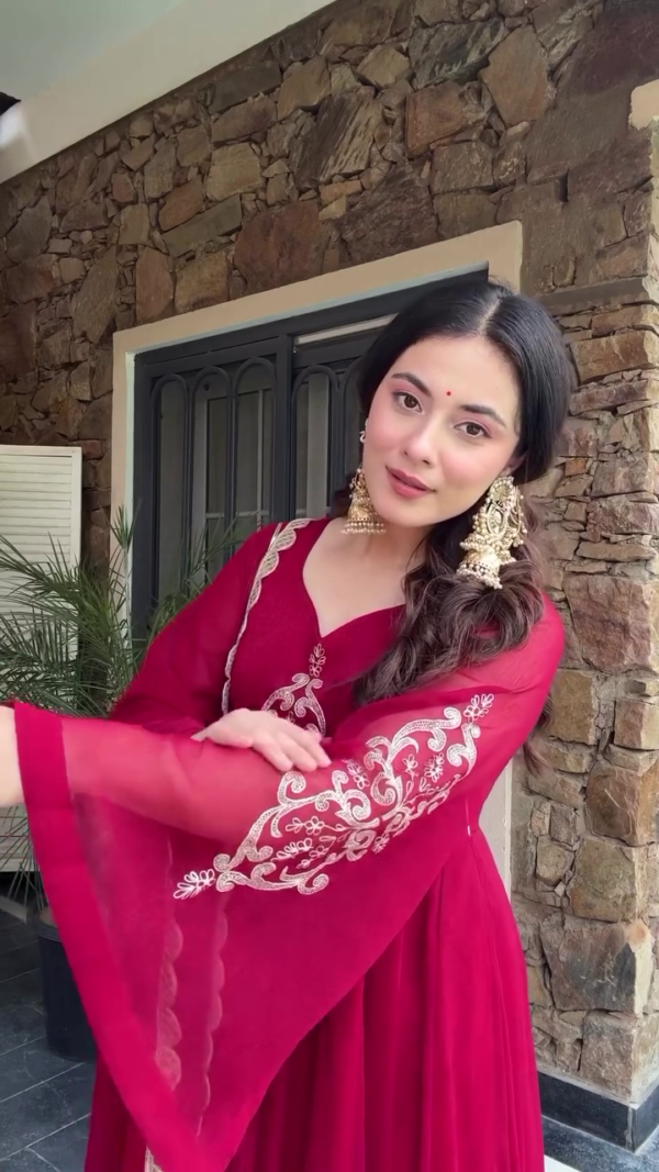 Elegant Red Anarkali Dress with Intricate Embroidery, Flowing Sleeves, and a Graceful Dupatta for Festive and Formal Occasions - Image 2