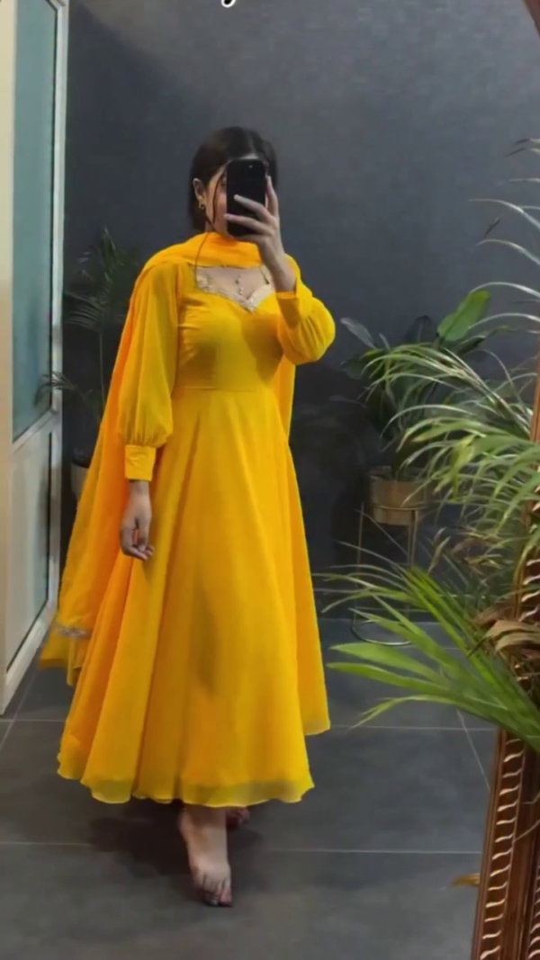 Bright Yellow Anarkali Dress with Elegant Embroidery at the Neckline and Flowing Sheer Dupatta – Perfect for Festive or Casual Occasions