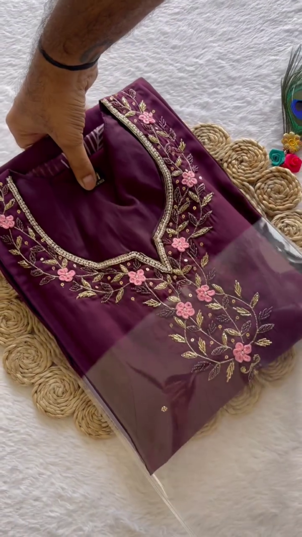 Plum Purple Straight-Cut Kurta Set with Intricate Pink Floral Embroidery – Paired with a Sheer Organza Dupatta Featuring White Leaf Motifs & Elegant Golden Accents – A Perfect Blend of Grace & Everyday Glam