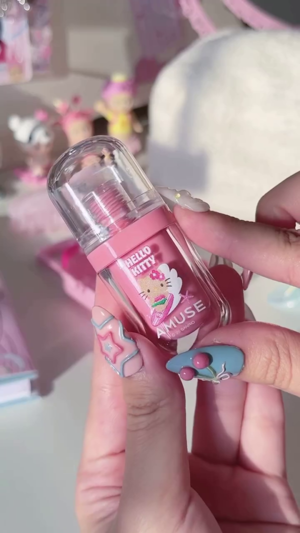 A cute Hello Kitty lip balm with a sweet pink hue, perfect for adding a pop of color and moisture to your lips. The adorable packaging adds an extra touch of charm to this playful beauty product.