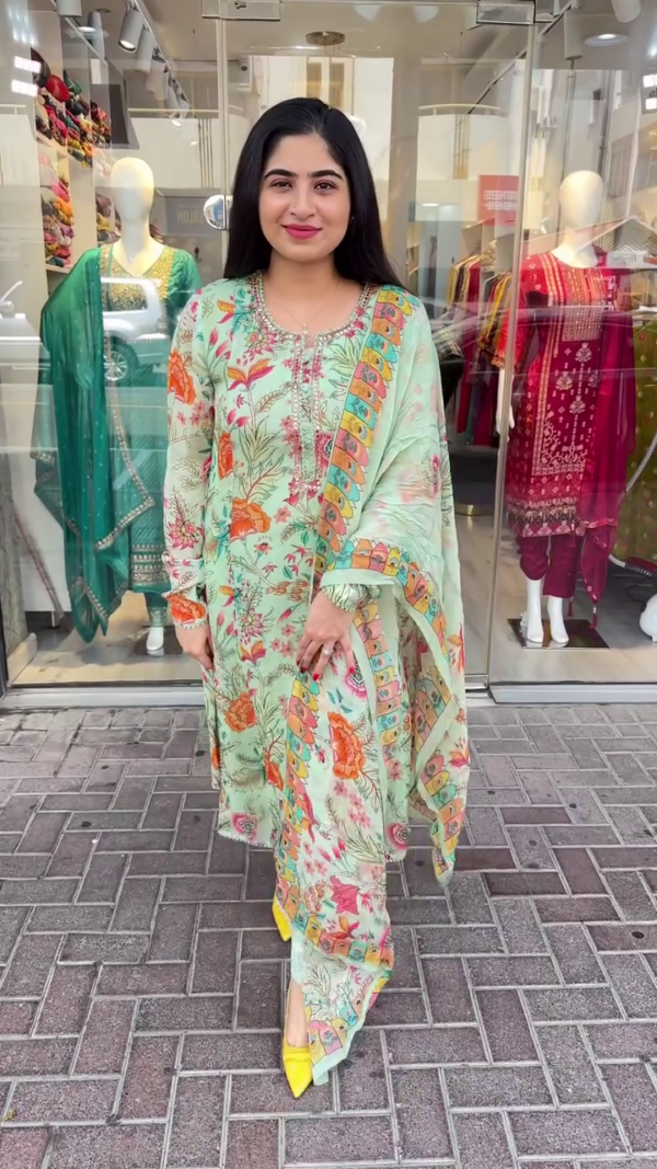 Floral Printed Pastel Suit Set in Pink and Mint Green – Featuring Elegant Thread and Sequin Embroidery on the Neckline, Paired with a Digitally Printed Dupatta Showcasing Multicolor Festive Motifs – A Breezy and Stylish Ensemble Perfect for Daytime Events, Festive Gatherings, and Summer Celebrations. - Image 2