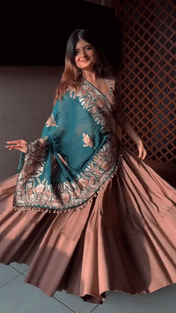 Elegant Brown Lehenga Set with Teal Embroidered Dupatta – Featuring Rich Floral Threadwork and Pearl Detailing for Festive and Wedding Wear