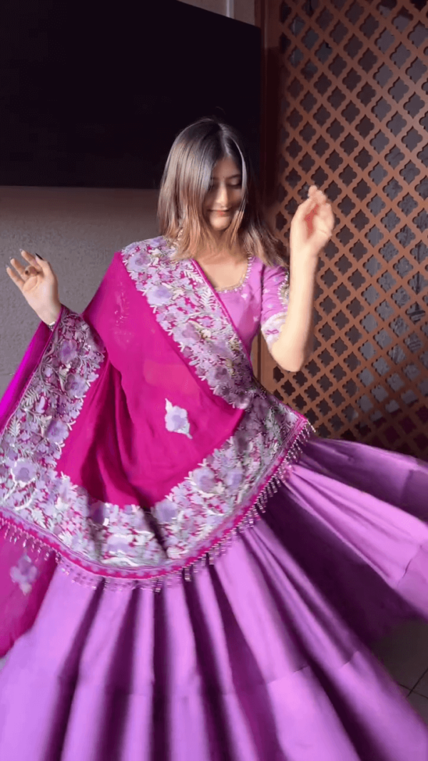 Radiant Purple Lehenga Set with Fuchsia Pink Dupatta – Adorned with Intricate Floral Thread Embroidery and Pearl Tassels for a Stunning Festive Look