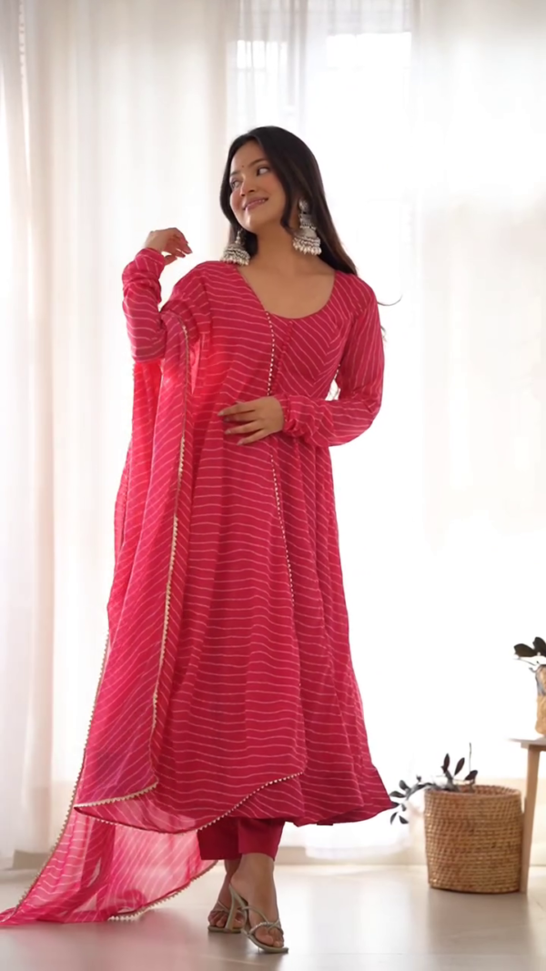 "Vibrant Pink Striped Anarkali Kurta Set with Flared Silhouette, Full Sleeves, Gota Lace Detailing, and Matching Dupatta – A Breezy and Festive Ethnic Wear Ensemble Perfect for Daytime Celebrations, Festive Gatherings, and Cultural Events