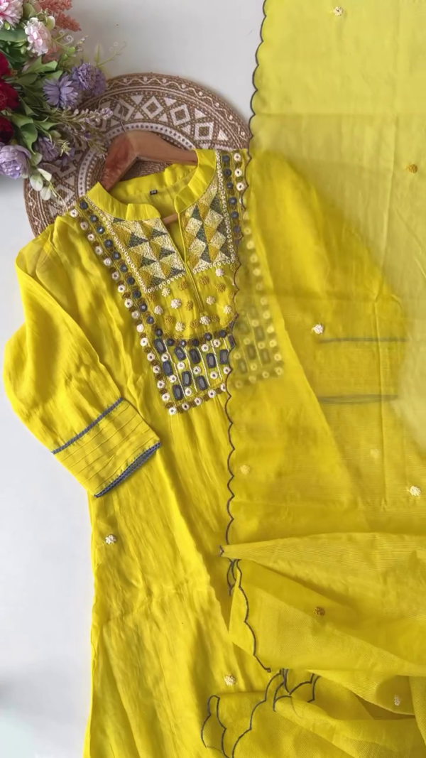 Vibrant Yellow Cotton Suit Set with Hand-Embroidered Mirror Work and Geometric Thread Detailing – Paired with a Soft