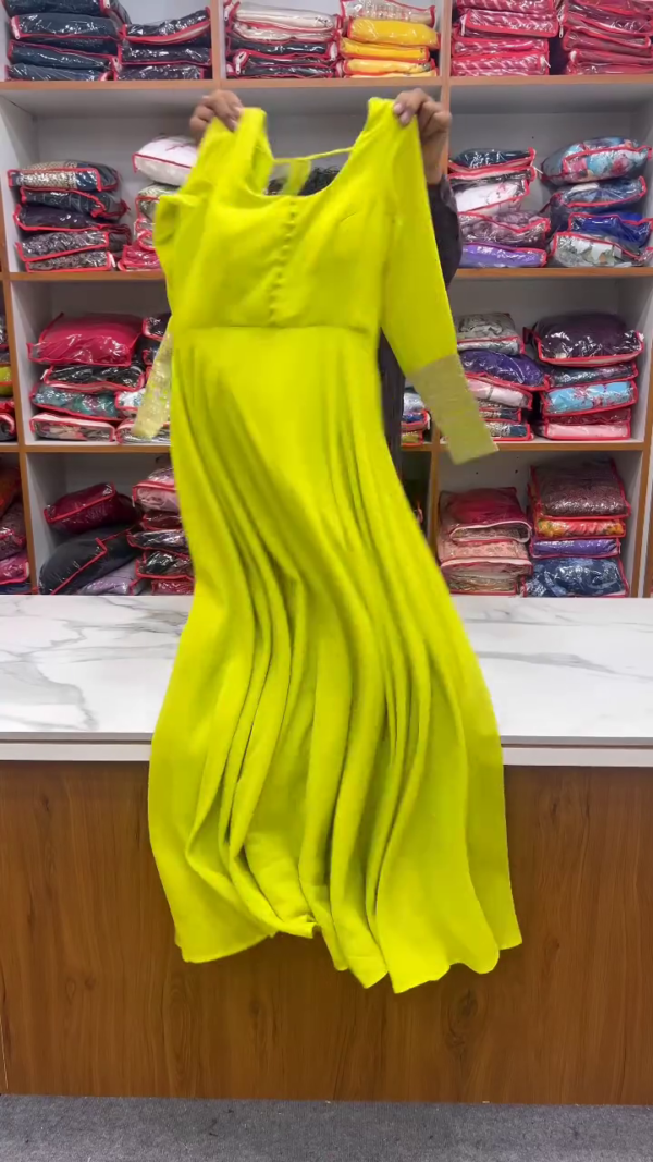 Luminous Lime Yellow Anarkali Gown with Front Button Detailing, Embroidered Golden Border Sleeves, and Sheer Net Dupatta Embellished with Intricate Floral Sequin Work – A Radiant and Elegant Ensemble for Haldi Ceremonies, Festive Functions, and Daytime Celebrations - Image 2
