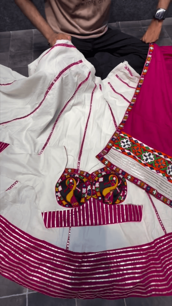 White and Pink Garba Lehenga Set with Mirror Work Stripes, Multicolor Embroidered Peacock Blouse & Contrast Dupatta – Perfect for Navratri and Festive Celebrations