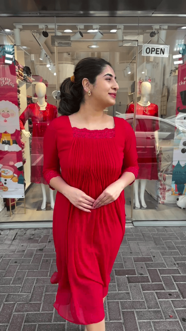 Elegant Red Pleated Dress with Floral Neckline Detailing for a Chic and Classy Look