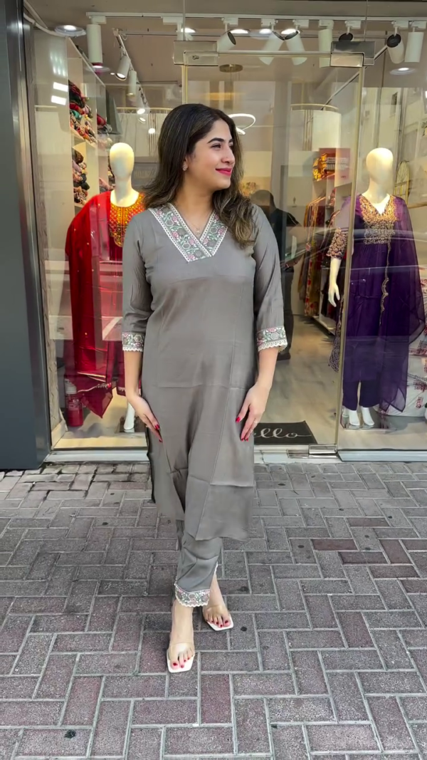 Grey Straight-Cut Kurta Set Featuring Intricate Floral Embroidery on V-Neckline, Sleeves, and Pant Hem – Minimalist Design in Soft Fabric for a Chic and Comfortable Look, Perfect for Office Wear, Casual Outings, and Semi-Formal Occasions