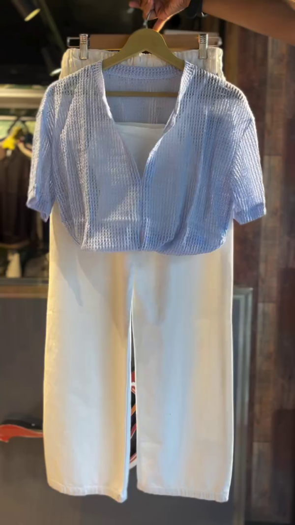 Trendy Two-Piece Co-ord Set – Light Blue Textured Short-Sleeve V-Neck Top with White Inner Lining Paired with High-Waist Wide-Leg White Pants for a Fresh, Casual Look