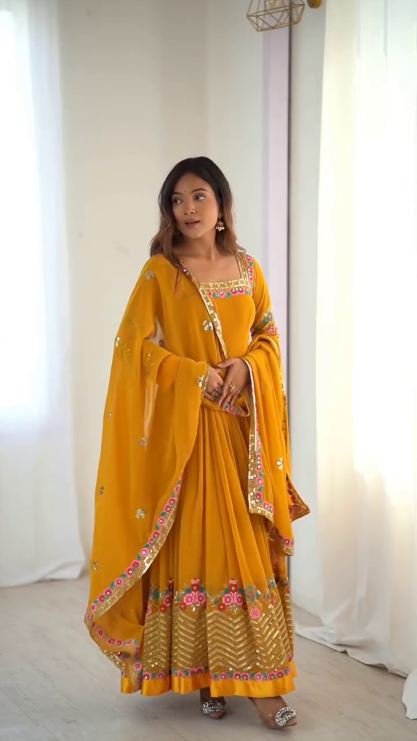 Vibrant Yellow Anarkali Suit with Floral Embroidery and Sequined Detailing – Paired with a Sheer Dupatta for Festive and Traditional Celebrations - Image 2