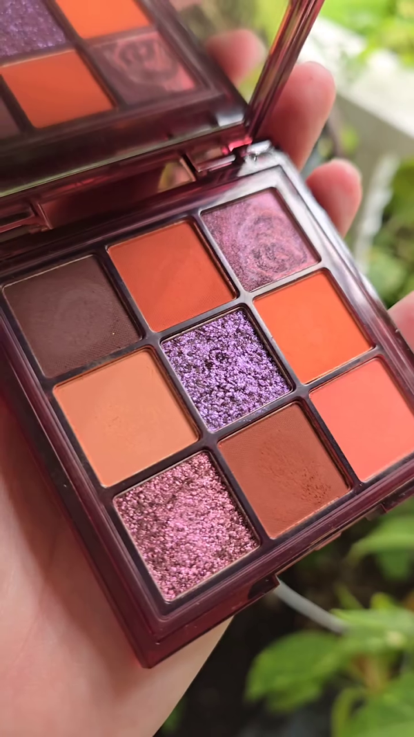 Bold 9-Pan Eyeshadow Palette Featuring Fiery Orange Mattes and Dazzling Pink and Purple Shimmers — A Striking Blend of Warm and Cool Tones for Vibrant, Artistic, and High-Impact Eye Looks