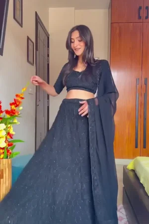 Black Embellished Lehenga Choli Set with Intricate Sequin and Threadwork Detailing – Featuring a Flowy Skirt with Beautiful Hemline Design