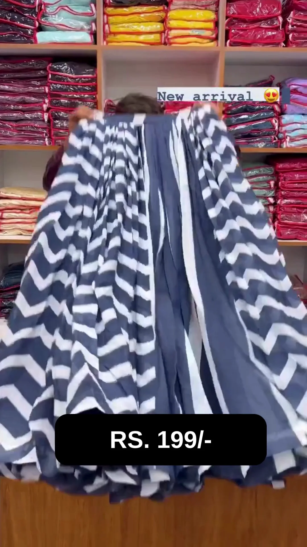 Contemporary Black and White Geometric Print Lehenga Set: Crop Top Choli with Puffed Sleeves and High-Waisted Chevron Skirt with Matching Dupatta