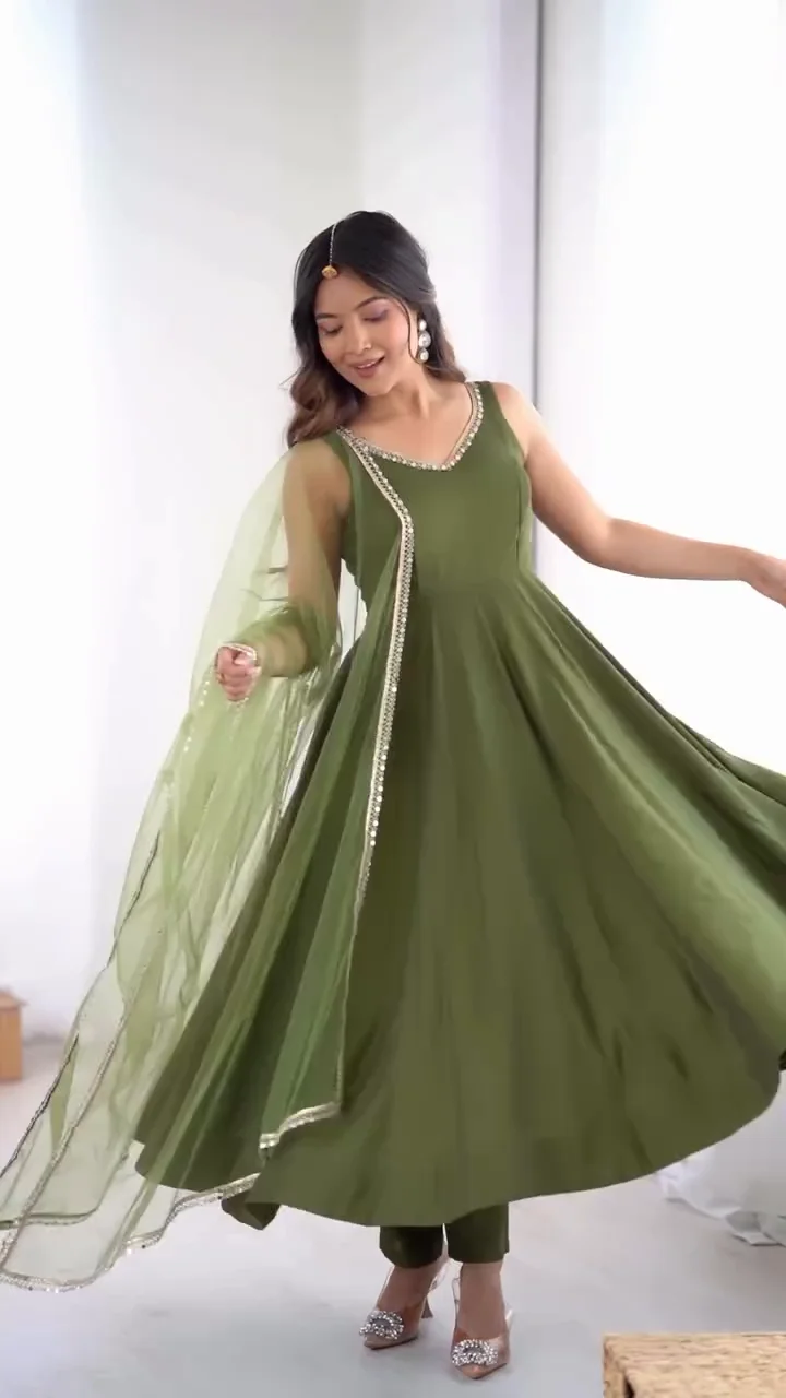 Stunning Olive Green Sleeveless Anarkali Gown Set with Wide Flare: Features Elegant V-Neckline Mirror/Sequin Work and Matching Dupatta with Decorative Border and Trousers